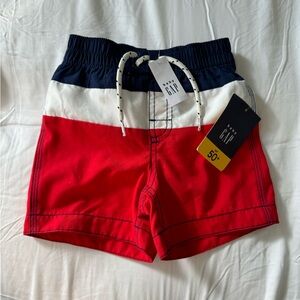 NEW WITH TAGS. Baby Gap boys swim shorts size 18-24.